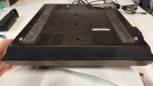 Sheet metal screws in bottom of console